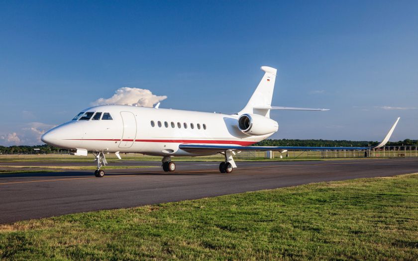 Dassault Falcon 2000LXS private jet taxiing on the runway