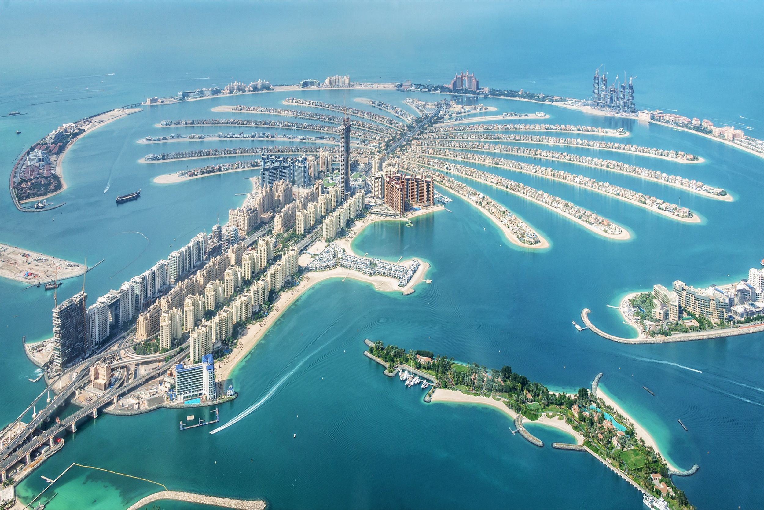 Aerial view of Dubai's Palm Jumeirah with its palm-shaped islands and turquoise waters